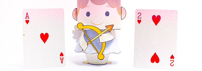 figurine of an angel Cupid with a bow on a white background. Valentine's Day. 