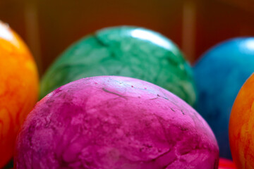 Selective focus, blurred background, Easter eggs on the table.