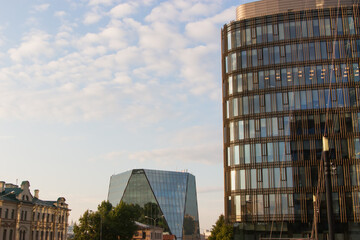 Fototapeta premium Old and modern architecture in city center evening.