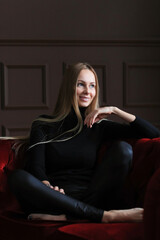 Obraz premium Happy blonde woman smiling at home