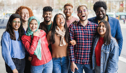 Young diverse people having fun outdoor laughing together - Diversity concept - Main focus on gay...