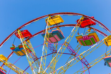 view of Ferris wheel in amusement park at Enez / Sunset time at Ferris wheel in amusement park 