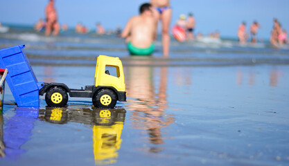children plays on the summer beach