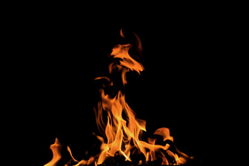 Close up burning flames on black background for graphic design or wallpaper