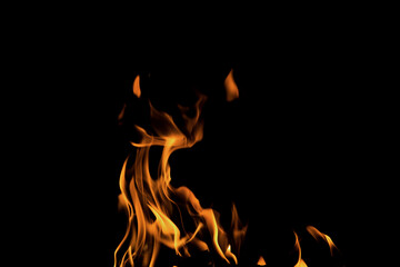 Close up burning flames on black background for graphic design or wallpaper