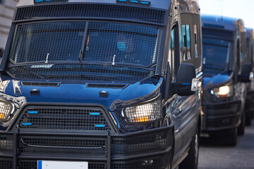 Armored police vehicles on the street. Protest and vandalism protection