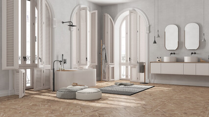 Contemporary bathroom in white tones in vintage apartment with arched window. Freestanding bathtub, washbasins and mirrors, carpet and rack with towels. Minimalist interior design