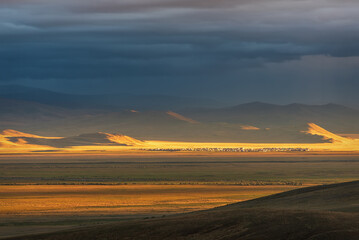 steppe sunset mountains village sunlight rain clouds