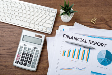 Business financial concept with calculator, computer, financial chart graph report