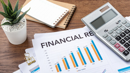 Financial statement review, financial chart data document with calculator