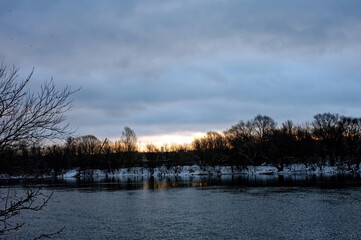 river bank on a cloudy winter day