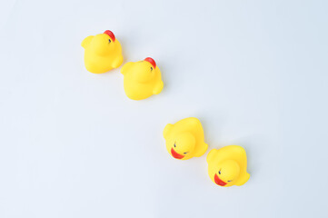 Toy ducks heading with different directions. Business innovation, think different and unique concept.