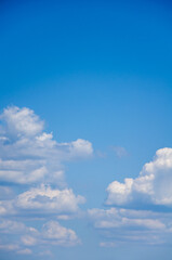 Blue sky with white cumulus clouds