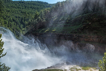 Montanejos, Valencia, Spain: 06.24.2021; The  water fog waterfall in Montanejos
