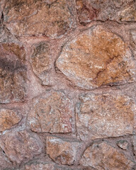 rough aged stone wall closeup