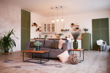 Modern open plan kitchen with living area and big window