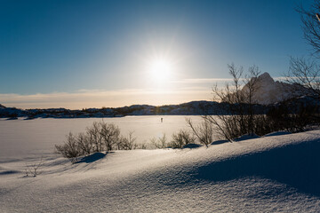 winter scenery of northern Norway Lofoten covered with snow in the beautiful afternoon sun