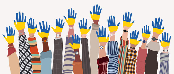 Group of raised arms of multicultural men and women who have their hands painted in the colors of the Ukrainian flag. Support for Ukraine. Peace concept. Stop the war. Isolated