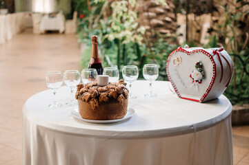 Beautiful wedding cake decorated with flowers, cake close up and blur background