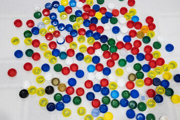 multicolored bottle caps. plastic. plastic bottle caps. concept of plastic problem in the world. healthy food concept.