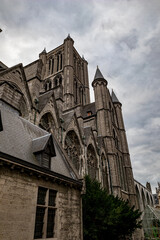 Fototapeta premium Moody daytime travel photograph from the historical center of Gent, Belgium. Cloudy sky.