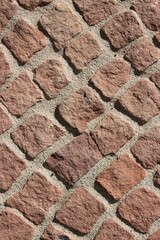 Close up of a red cobblestone walkway