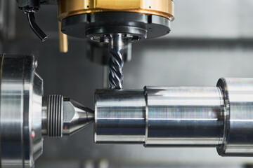 milling on lathe cnc machine. metal cut industry. Precision manufacturing and machining
