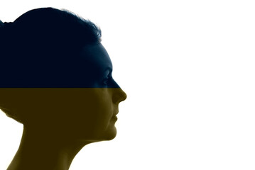 Silhouette of a woman's face filled with colors of the Ukrainian flag.