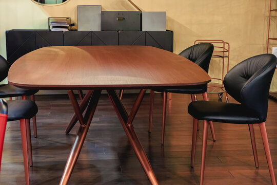 Wooden Oval Table With Black Leather Chairs