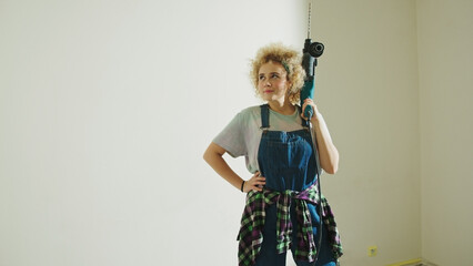 Attractive Caucasian Girl thinking about new DIY Project - copy space. High quality photo