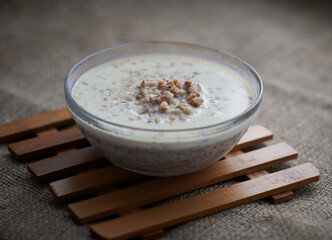 buckwheat with milk in a clear glass bowl