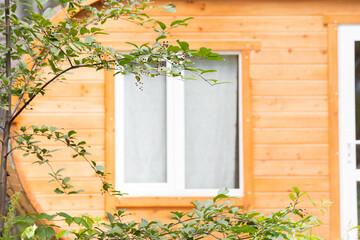Wooden summer house or mobile cabin in the camp site. Living in nature and recreation