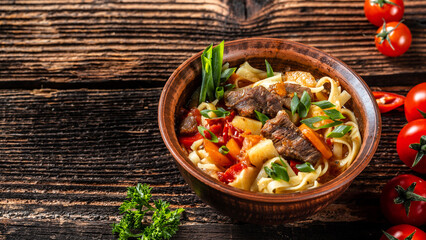 Top view of lagman or laghman Uzbek and Central Asia cuisine concept. Assorted Uzbek food