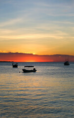 Dramatic beautiful colorful sunset at the ocean on equator. Tanzania, Zanzibar.