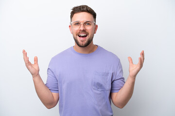 Fototapeta premium Young caucasian man isolated on white background smiling a lot