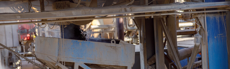 Close of professional industrial equipment grinding material at factory or manufacturing plant