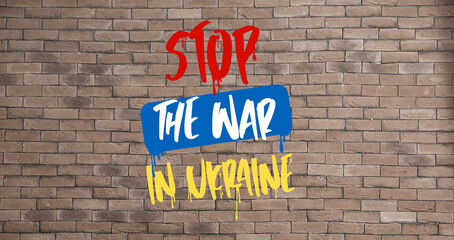 Text STOP THE WAR IN UKRAINE on brick wall