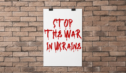 Poster with text STOP THE WAR IN UKRAINE written in blood on brick wall