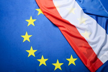 Flags of European Union and France as background, closeup