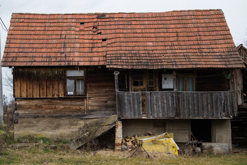 Sunja, Croatia, April 20,2021 :Abandoned traditional old wooden house.&nbsp;