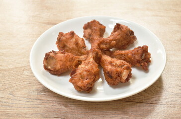 crispy fried chicken drum wing arranging on plate