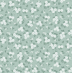 Spring flowers print. Vector seamless floral pattern. Floral design for fashion prints. Endless print made of small white flowers. Elegant template. Light Gray blue  background. Stock vector.