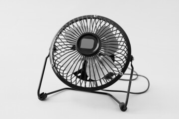 Desktop cooling fan on grey background