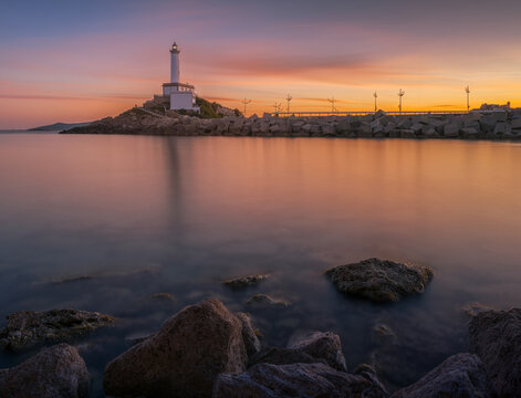 Botafoch lighthouse at sunset with red sky , Ibiza