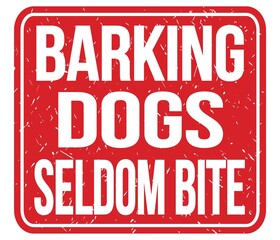 BARKING DOGS SELDOM BITE, words on red stamp sign