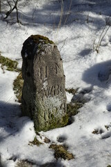 Boundary stone NRW, RLP, southernmost point of Westphalia, winter day in Westerwald, concept: extreme point, history, separation (vertical), Oberdresselndorf, NRW, Germany