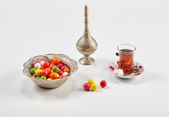 Candy turkish style ramadan with coffee table style on the white table.