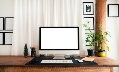 home office desk,Computer screen on a wooden table in the house