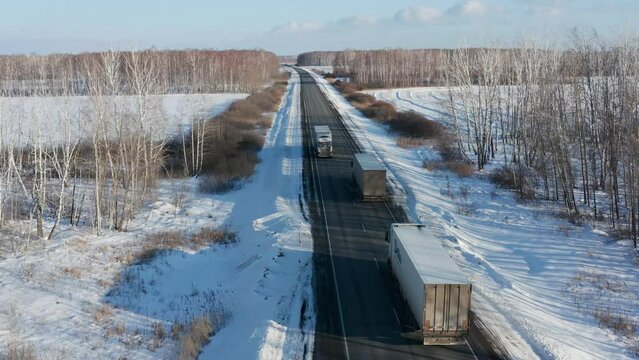 Trans-Siberian highway. Traffic on the Omsk - Novosibirsk AH6 "Irtysh" highway. Aerial view.