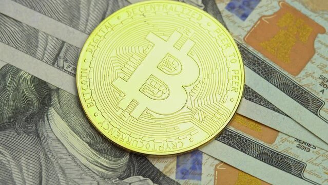 Bitcoin BTC coin lies on US dollars, digital coin cyberspace cryptocurrency background, bitcoin and ethereum ETH in the blockchain system. Concept of exchange market and online payment